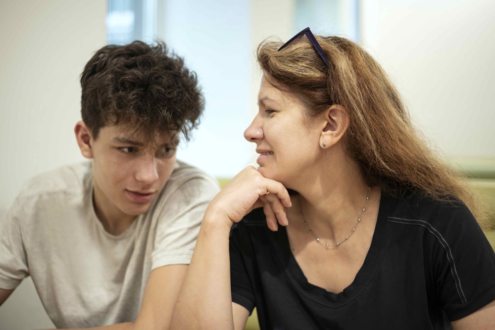Mother and teenage son