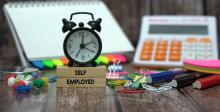 Self-employed sign on a desk